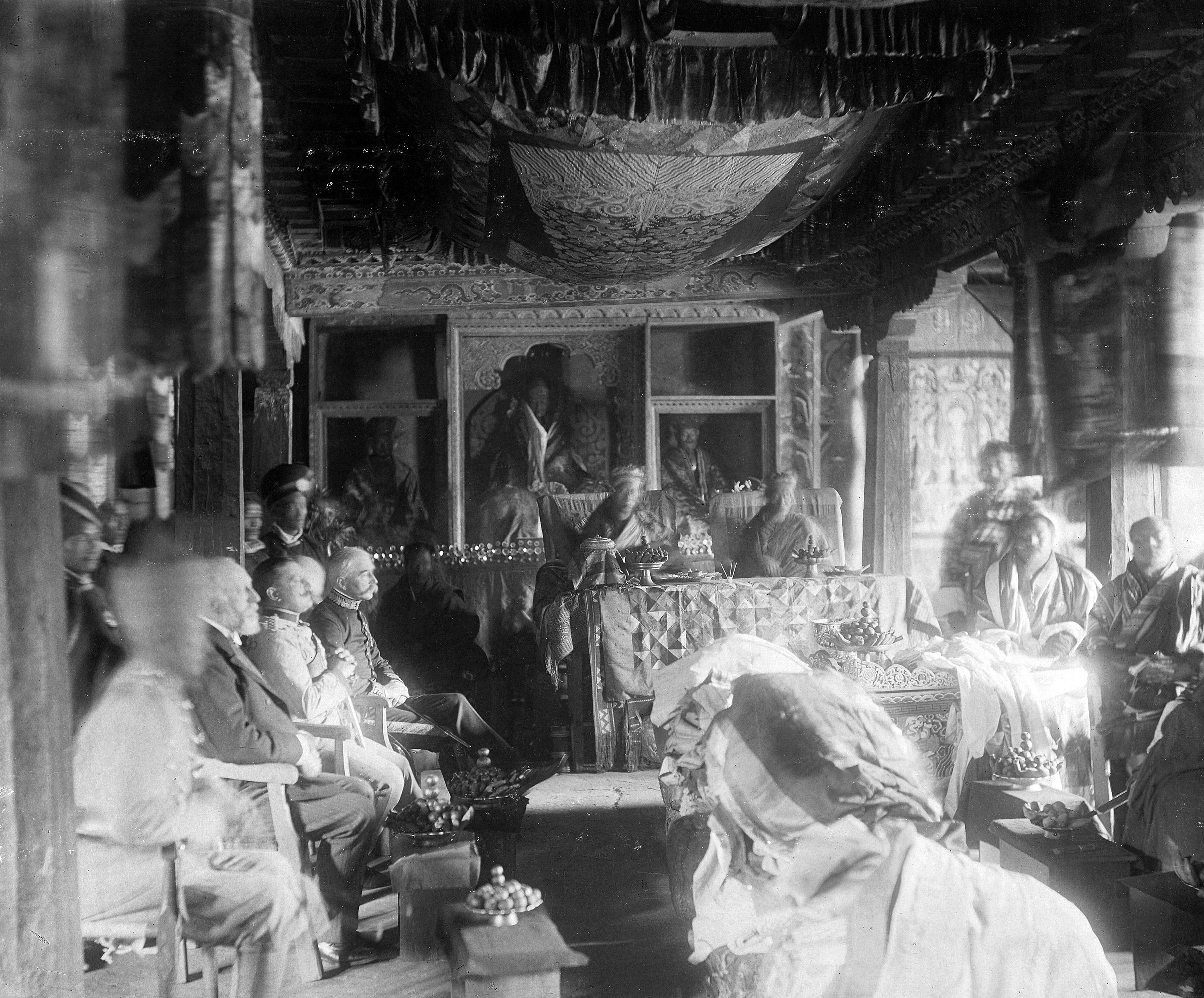 Bhutan King Ugyen Wangchuck receiving the Order of Knight Commander of the Order of the British Empire from British officials at Punakha Dzong in January 1905.