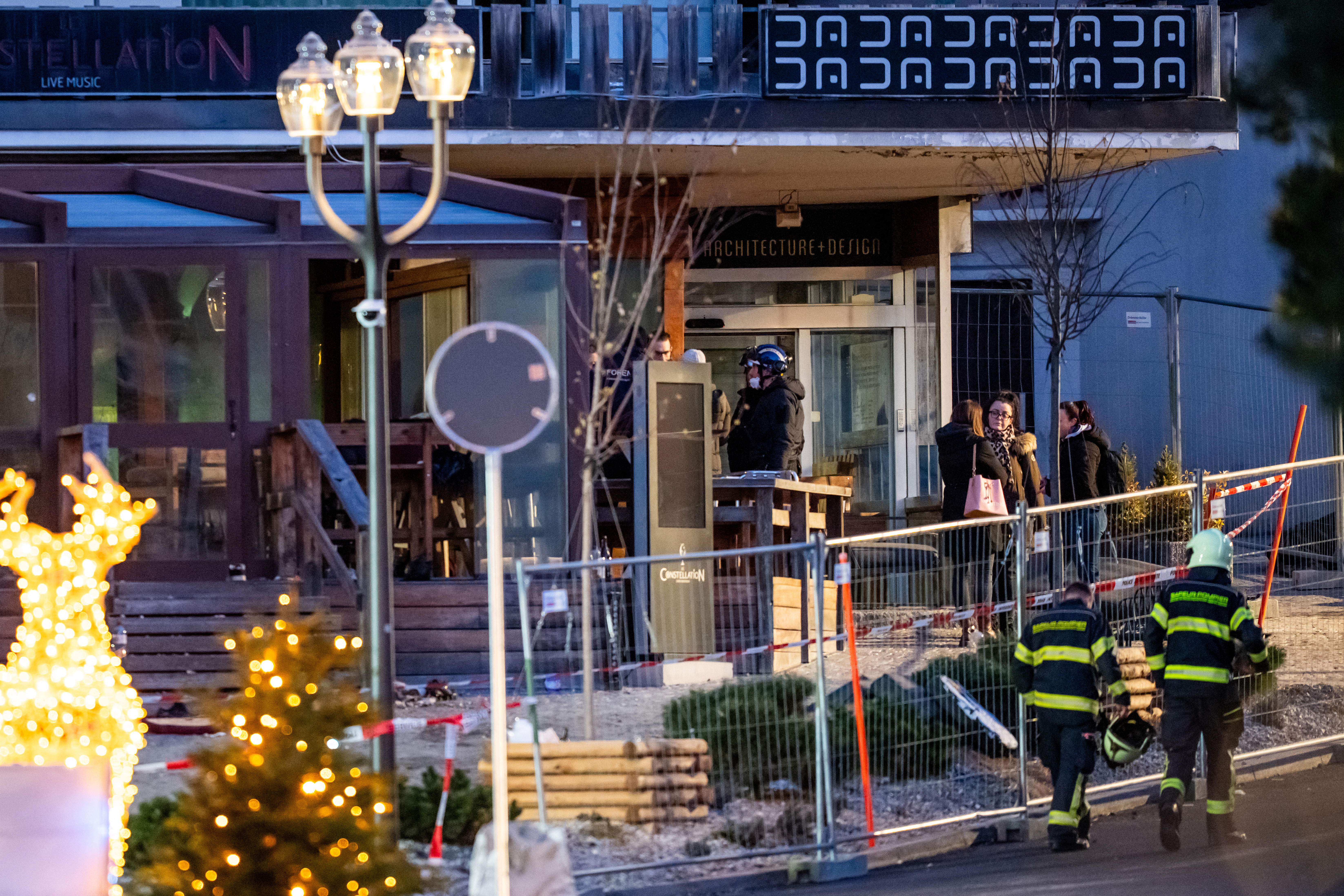 Rescuers on scene at the site of a bar explosion in Crans-Montana.