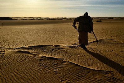 Migrants often cross the Libyan desert to reach smuggling routes across the Mediterranean Sea.