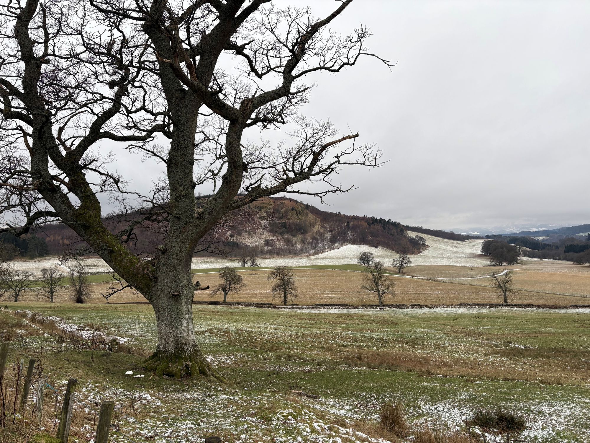 Fields of melting snow near the A822 near Dunkeld, Perth and Kinross