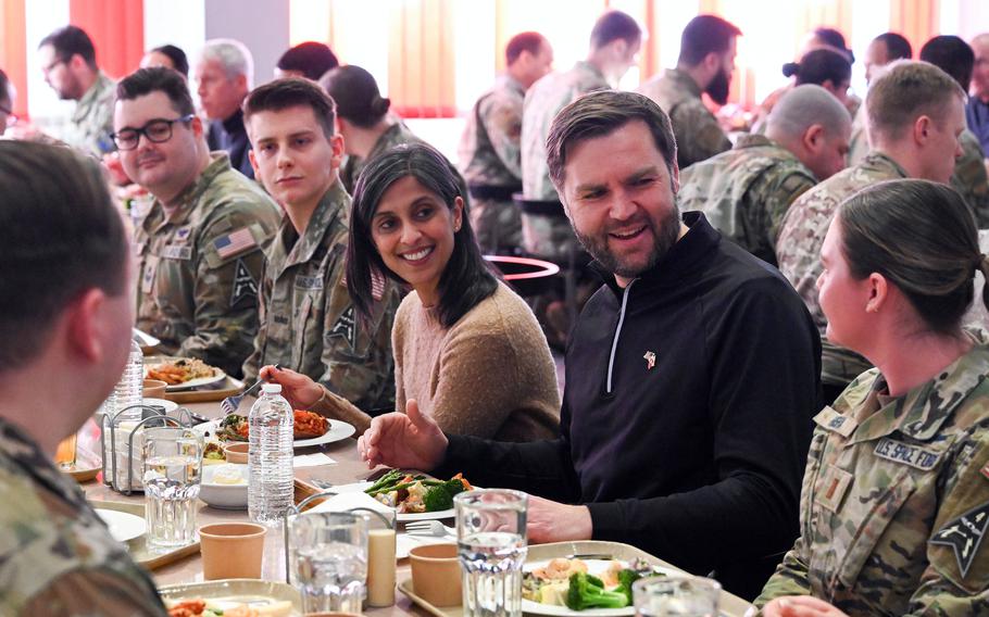 Vice President JD Vance and his wife share a meal with service members.