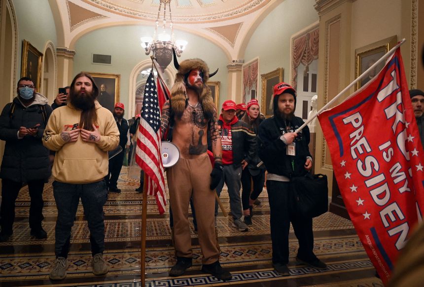 Supporters of US President Donald Trump enter the US Capitol on January 6, 2021.