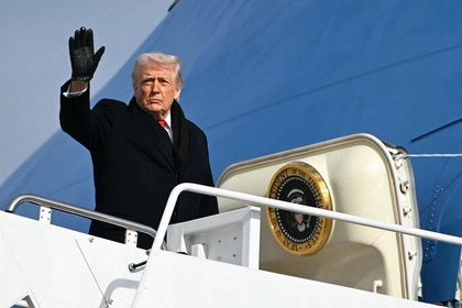 Trump Heads into Davos Storm, with an Eye on Home