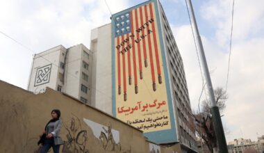 An Iranian woman walks next to an anti-US mural in Tehran, Iran, 29 January 2026. The US President Donald Trump on 28 January renewed threats of military action against Iran, saying time is running out for Iran to make a deal. Tension has increased after anti-government protests in Iran erupted since 08 January 2026.