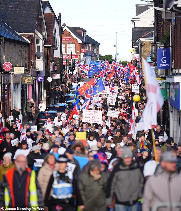 The decision to house asylum seekers at the Army base has led to widespread protests in the East Sussex town