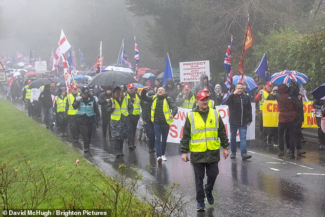 Patrol group members are distinguishable by their red baseball caps and high-vis jackets