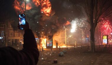 A tram stop is blown up with a makeshift explosive device as groups of residents from neighboring streets clash using fireworks in the Transvaal district on January 1, 2026 in The Hague