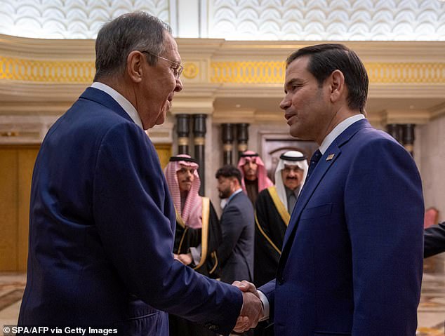 Russian Foreign Minister Sergei Lavrov shakes hands with Secretary of State Marco Rubio (right) in a handout photo during their meeting in Riyadh, Saudi Arabia in February
