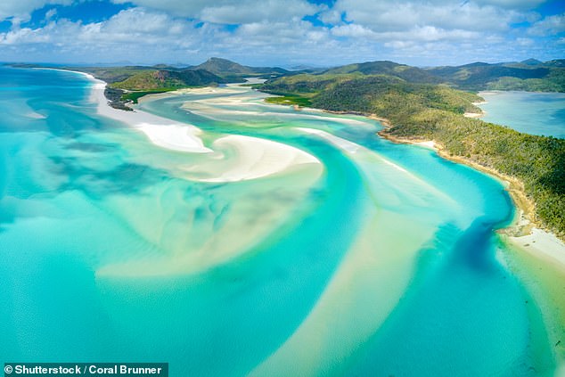 Whitehaven Beach on the Whitsunday Islands, Queensland. Whitsunday is an archipelago of 74 islands