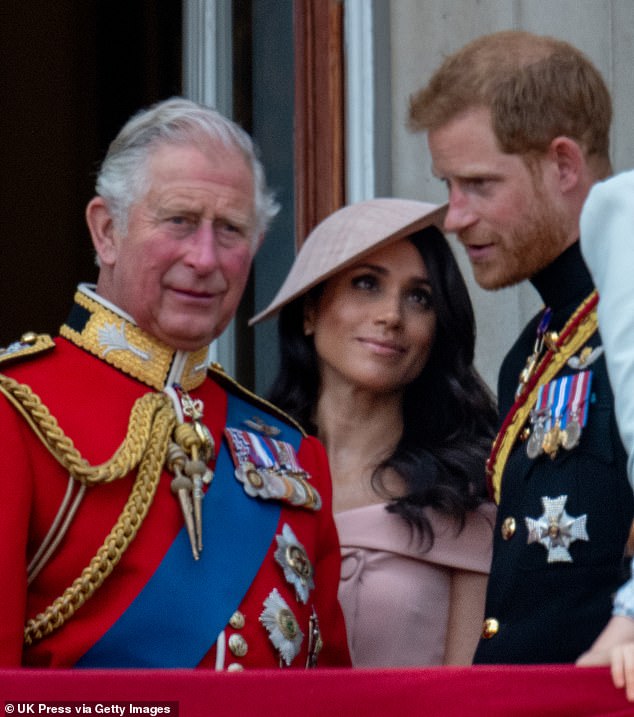 Charles with Harry and Meghan during Trooping the Colour in 2018