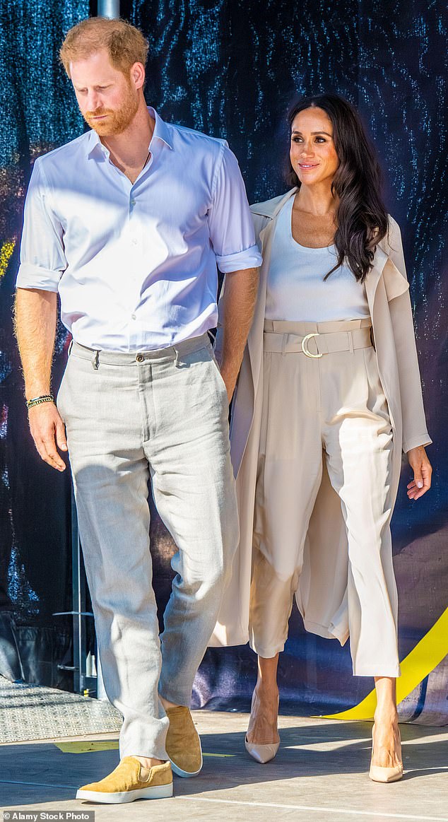 The duke, 41, has consistently argued that the UK is not safe for him, his wife Meghan Markle (right) and his children to visit without 24-hour armed protection