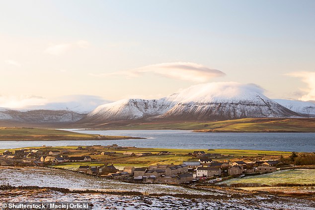 Snow on hills on Orkney Islands in northern Scotland in winter