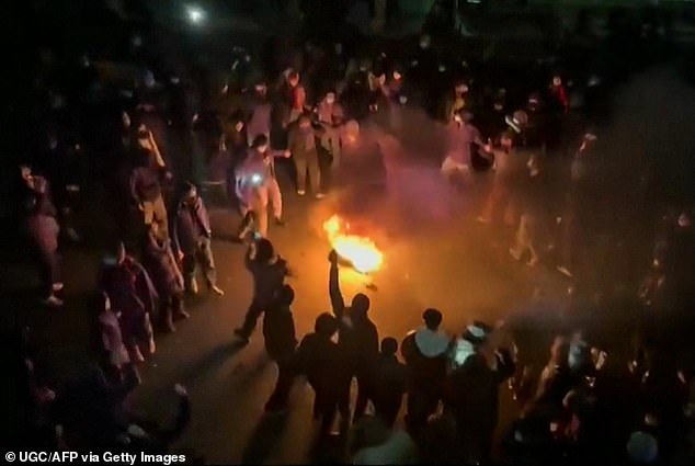 The protests are said to span all 31 of Iran's provinces, with reports of buildings on fire, cars overturned and cries of 'death to the dictator' in the streets