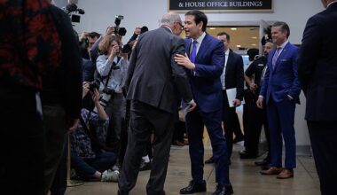 Marco Rubio was pictured wearing the shoes he had received as a gift from President Trump  as he met Senate Minority Leader Charles Schumer