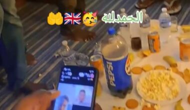 Suspected migrants have shared a video of themselves eating food at a social gathering in what is suspected to be temporary accommodation in Britain