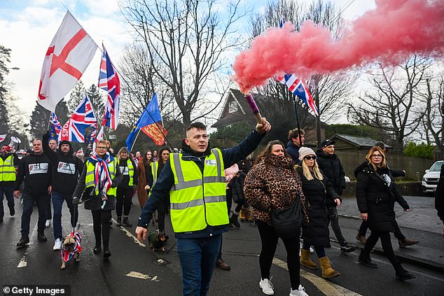 Crowds march through Crowborough during the peaceful protest on December 14, 2025