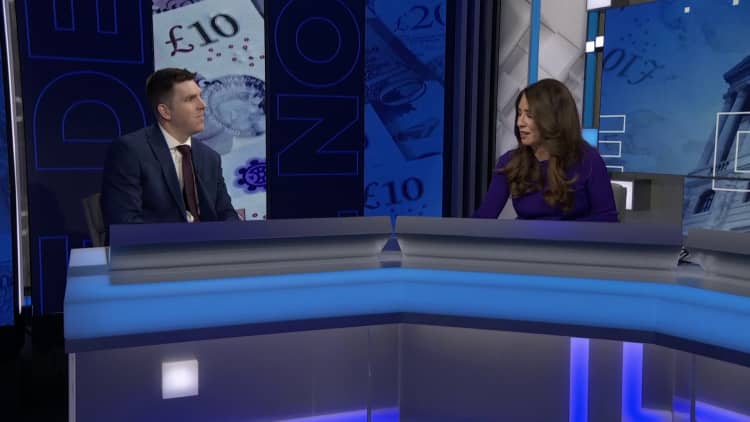 Bank of England cuts rates, but signals caution