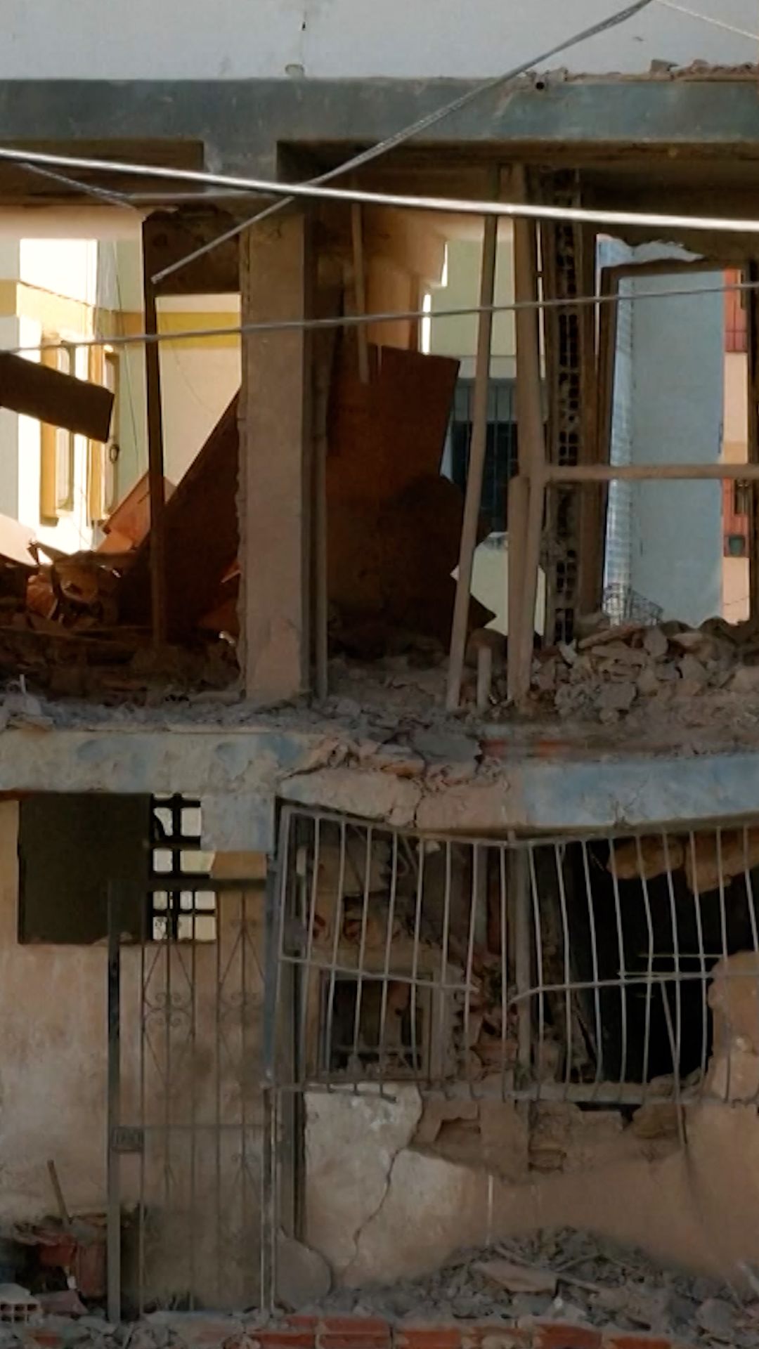 116142_venezuelans rubble in homes vert.00_00_41_15.Still001.jpg