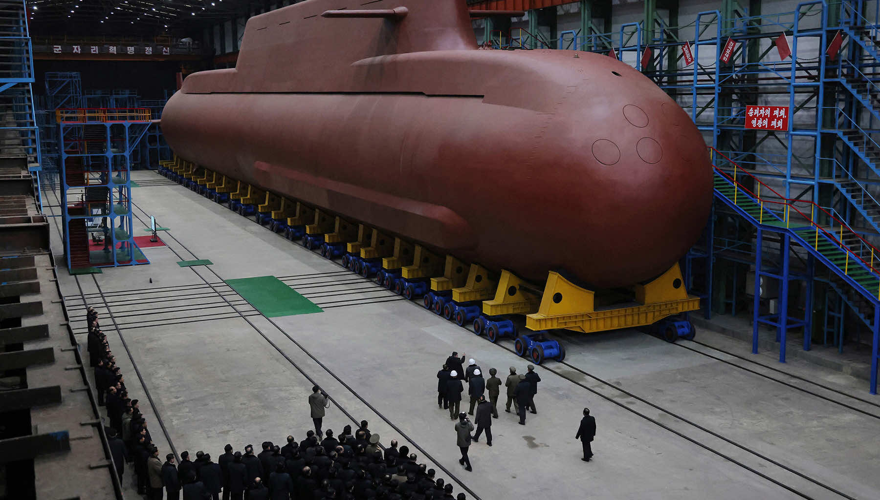 Kim Jong Un shows off a nearly complete nuclear submarine as North Korea expands naval capability