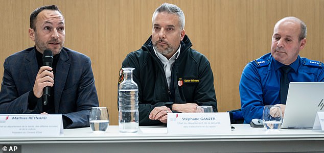 From left, Mathias Reynard, State Councillor and president of the Council of State of the Canton of Valais, Stephane Ganzer, State Councillor and head of the Department of Security, Institutions and Sport of the Canton of Valais and Frederic Gisler, Commander of the Valais Cantonal Police, during a press conference in Lens, following a fire that broke out at the Le Constellation bar and lounge leaving people dead and injured, during New Year's celebration, in Crans-Montana, Swiss Alps, Switzerland, Thursday, Jan. 1, 2026. (Alessandro della Valle/Keystone via AP)
