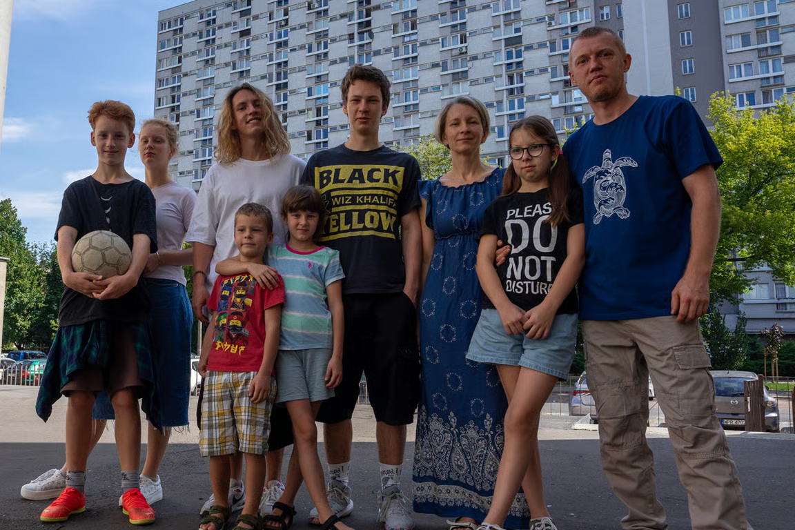 Siarhei Melianets (R), his wife and their seven children. Photo: Siarhei Melianets