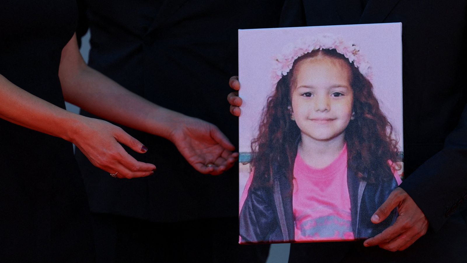 A picture of Hind Rajab is held on the red carpet ahead of the screening of The Voice Of Hind Rajab at Venice's film festival. Pic: Reuters