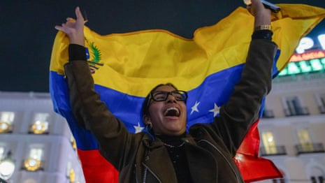 Celebrations and protests take place around the world after Venezuela strikes – video