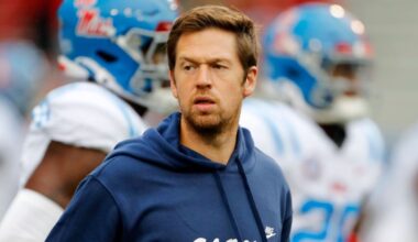 LSU's Weis with Ole Miss for game; has done 'terrific job'