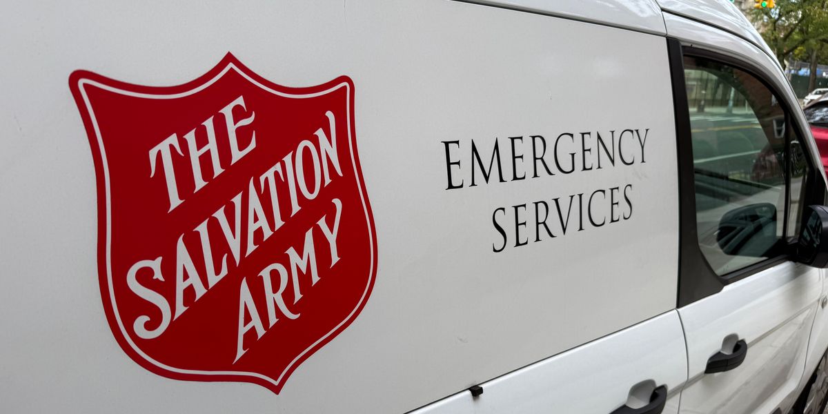 Salvation Army worker who was sacked after saying migrants should be sent back 'on a boat' defiantly hits out: 'I am not racist!'