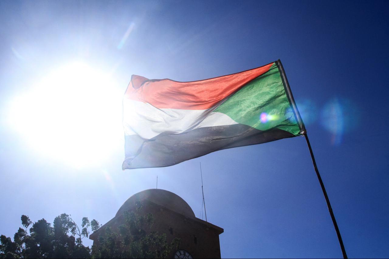 The Sudanese flag flutters in Omdurman, part of greater Khartoum, on December 13, 2025. (AFP Photo)