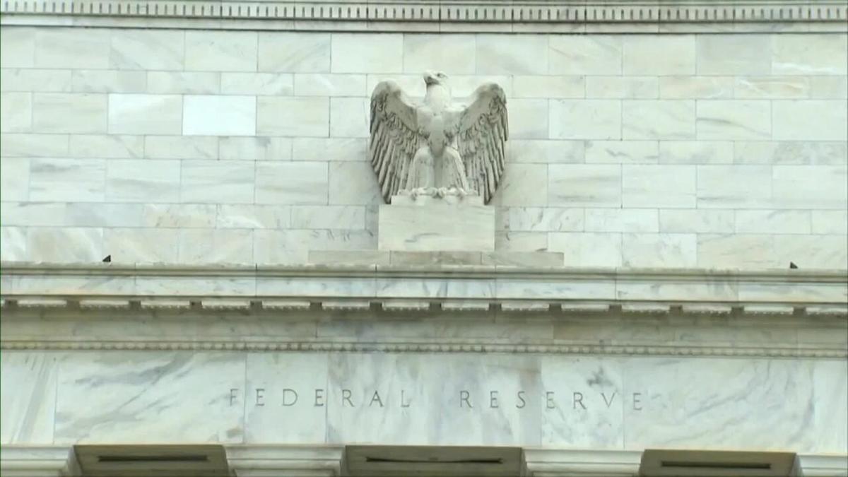 Wall Street falls with financials hit amid credit card rate plan