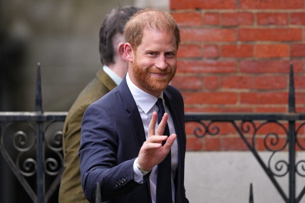 Britain's Prince Harry arrives at London's High Court to lead a group, including Elton John...