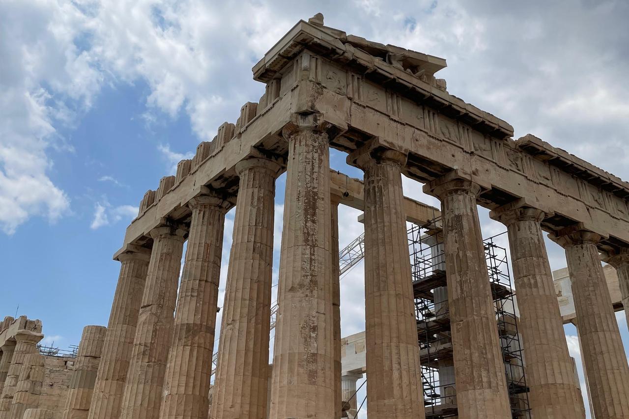 The Parthenon on the Acropolis of Athens, with restoration scaffolding visible among its Doric columns, Athens, Greece, July 26, 2024. (Photo by Koray Erdogan/Türkiye Today)