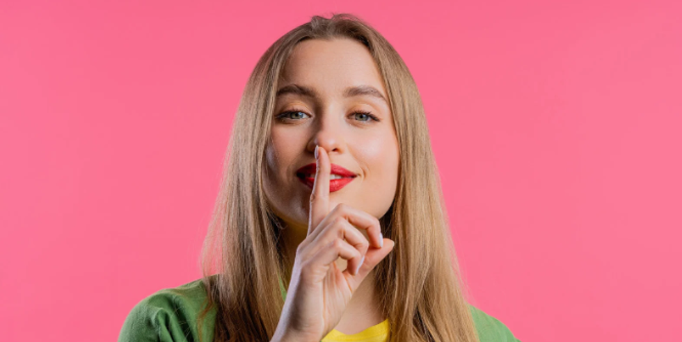 shhh, quiet, finger on lips, lipstick, mouth shut,