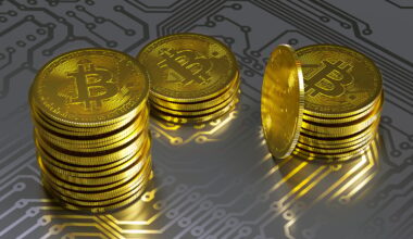 An illustration of Bitcoin tokens on a circuit board.