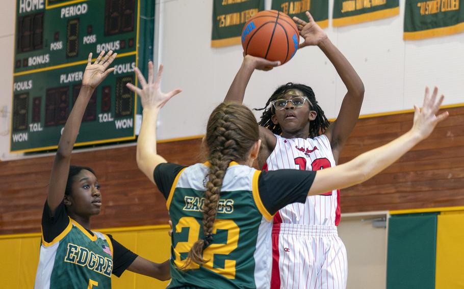 Justice Owens shoots.