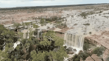Spectacular waterfalls flow south of Winton after deluge of rain in outback Queensland – video