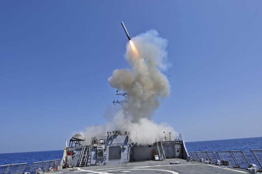 The guided-missile destroyer USS Barry launches a Tomahawk cruise missile from the ship's bow in the Mediterranean Sea in this US Navy handout photo dated March 29, 2011.