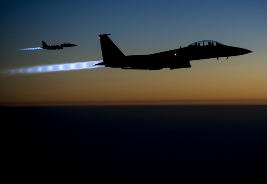 A pair of US Air Force F-15E Strike Eagles fly over northern Iraq after conducting airstrikes in Syria, in this U.S. Air Force handout photo taken early in the morning of September 23, 2014.