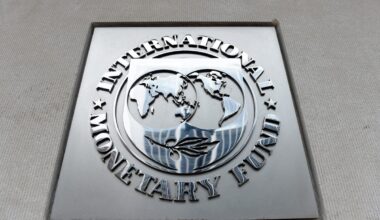 An exterior view of the building of the International Monetary Fund (IMF), with the IMG logo, is seen on March 27, 2020 in Washington, DC. AFP / Olivier DOULIERY