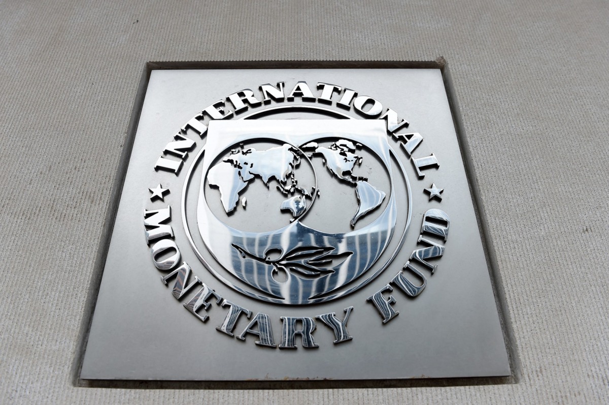 An exterior view of the building of the International Monetary Fund (IMF), with the IMG logo, is seen on March 27, 2020 in Washington, DC. AFP / Olivier DOULIERY