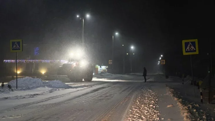 Snow removal on a road in Stolbtsy district