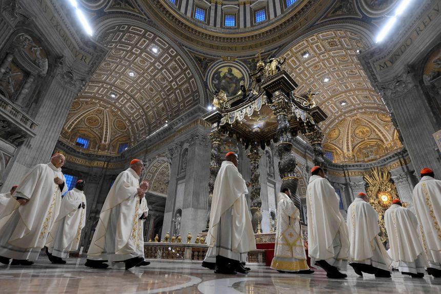 Cardinals walk as they attend a Vatican summit with Pope Leo XIV.