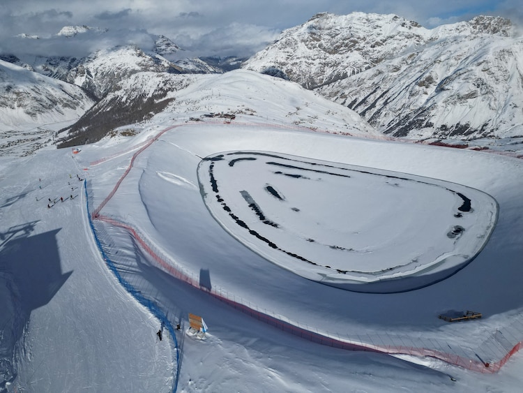A snowmaking reservoir surrounded by ski slopes in Italy. (Photo: Reuters)
