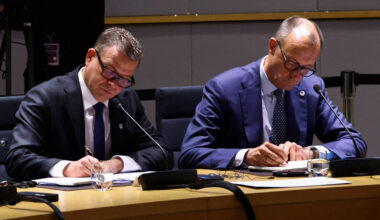 Finnish Prime Minister Petteri Orpo and German Chancellor Friedrich Merz sit at the roundtable on the day of a special summit of European Union leaders to discuss transatlantic relations following US President Donald Trump's threats to impose new tariffs on goods from a list of EU countries over his demand to acquire Greenland, in Brussels, on Jan. 22, 2026.