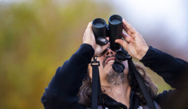 Justin Streit, a senior technical director with SWCA Environmental Consultants, spots another b ...