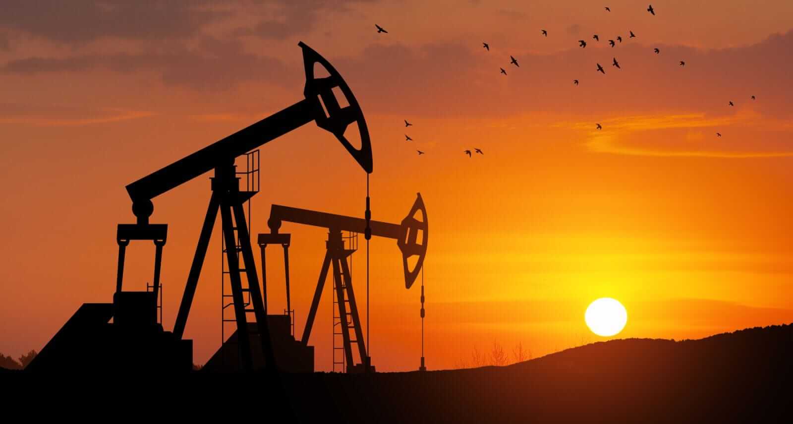 2 pumpjacks at sunset by vadimrysev via iStock