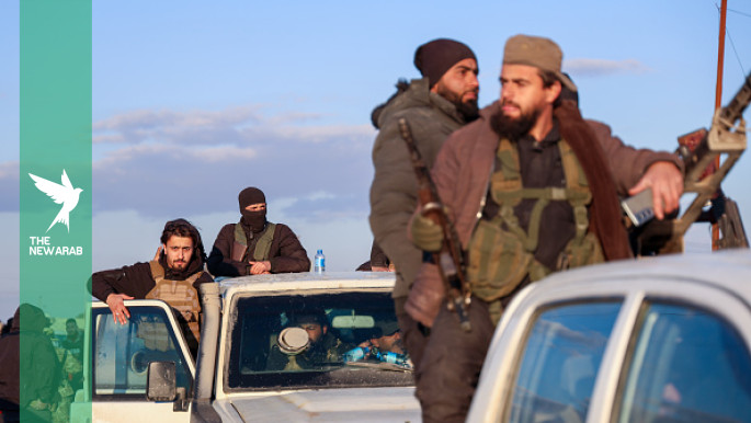 Hundreds of armed Iraqi Kurds cross into northeast Syria