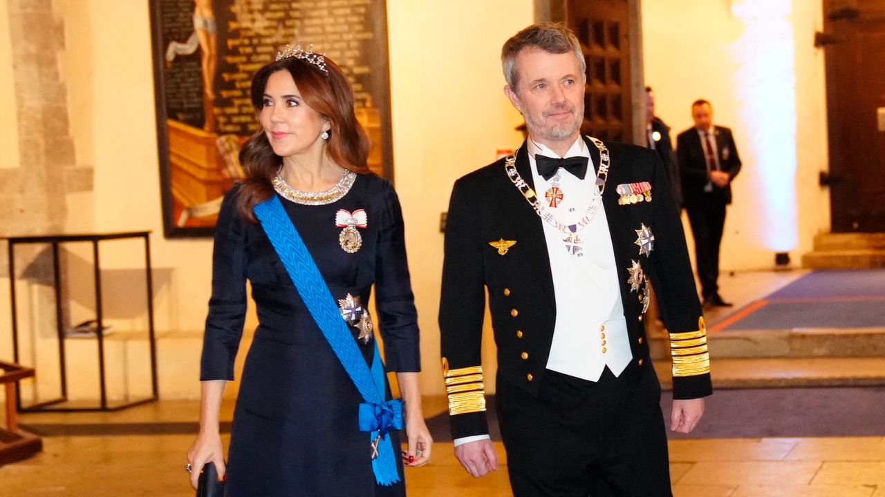Queen Mary of Denmark glitters in her diamond wedding tiara as she joins husband King Frederik at a state banquet in Estonia