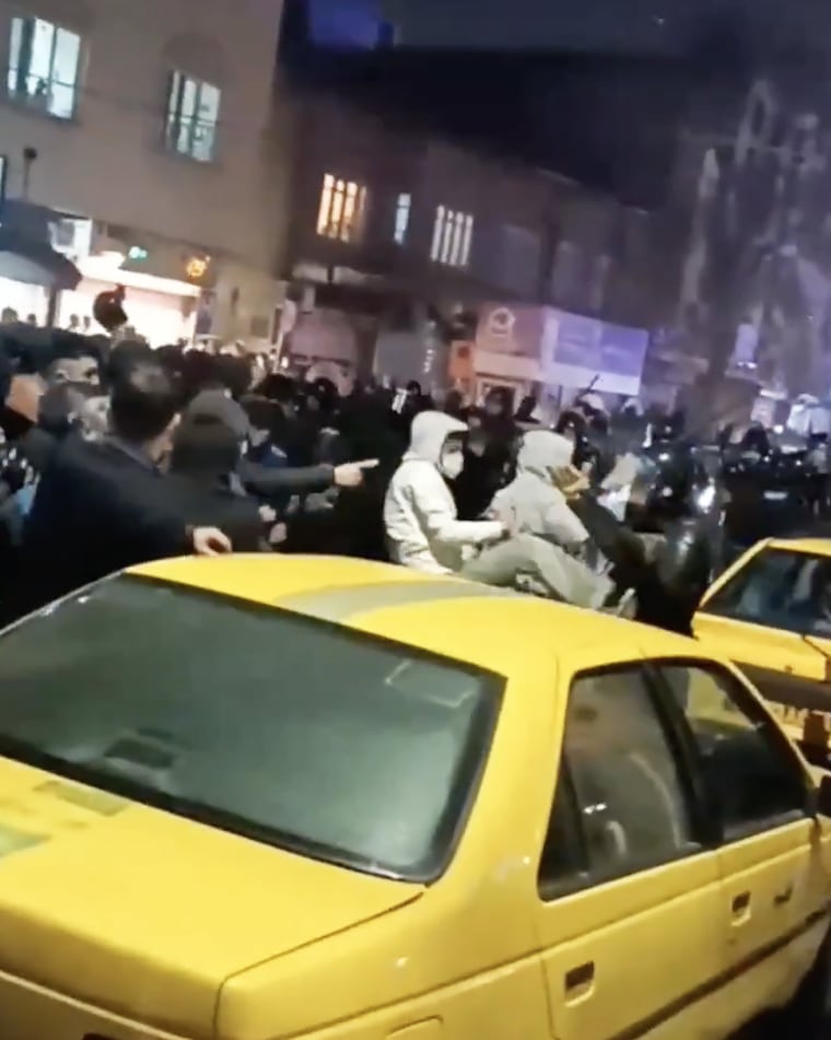 Protesters fight security forces in Urmia, Iran, in a video that circulated on social media Monday.